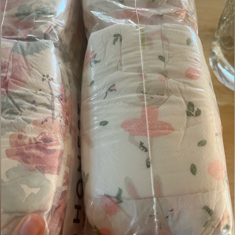 Sealed NEW Honest newborn diapers in floral Corinth and ballerina print.